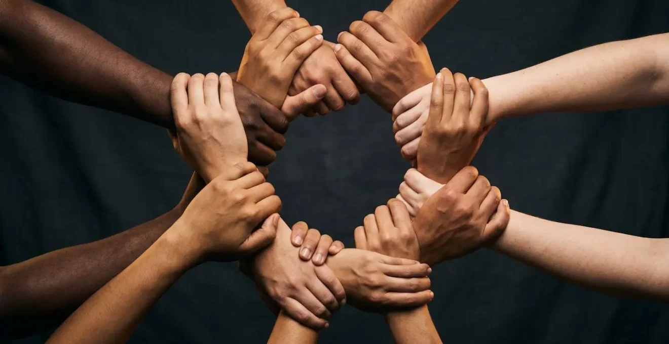 Symbolic representation of supportive leadership through interconnected hands forming a circle from different perspectives